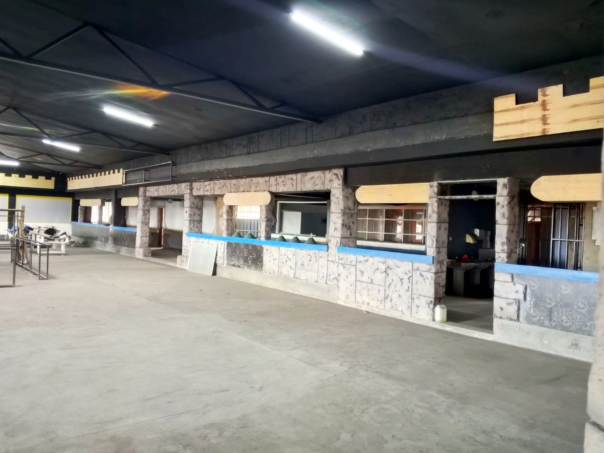 The stone-effect counter along one side of the hall