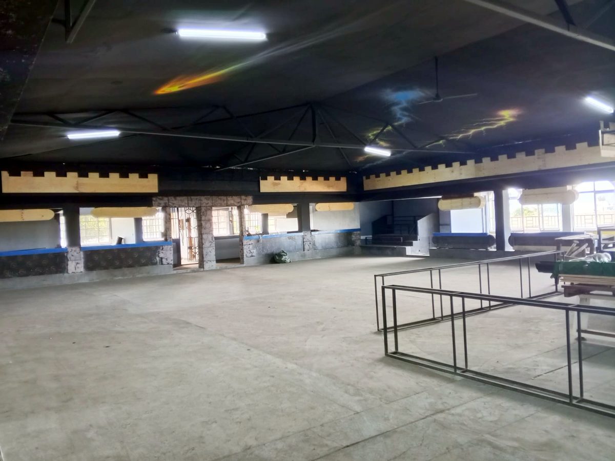 The empty main hall with the castle-style trim